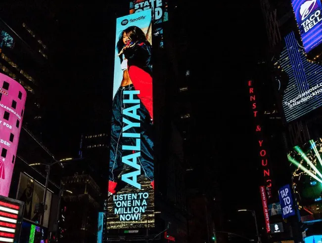 Aaliyah One in a Million billboard in Times Square at night
